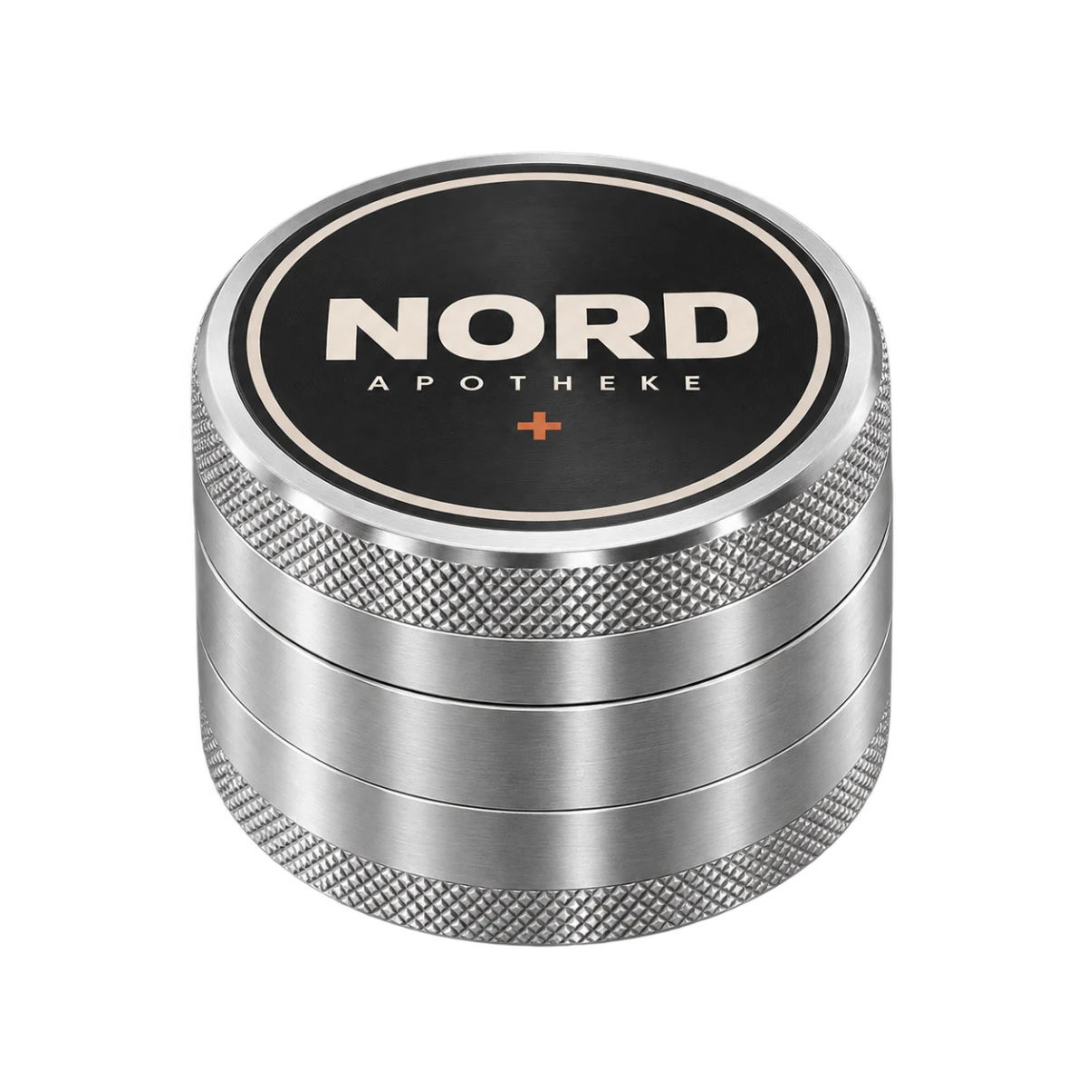 Geschlossener silberner Metall-Grinder mit fiktivem NORD Apotheke Branding
